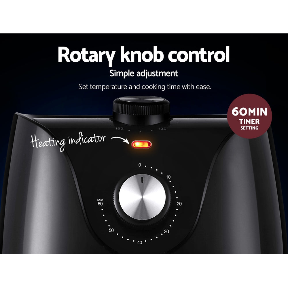 Black kitchen appliance with rotary knob control and heating indicator, featuring text on a black background.