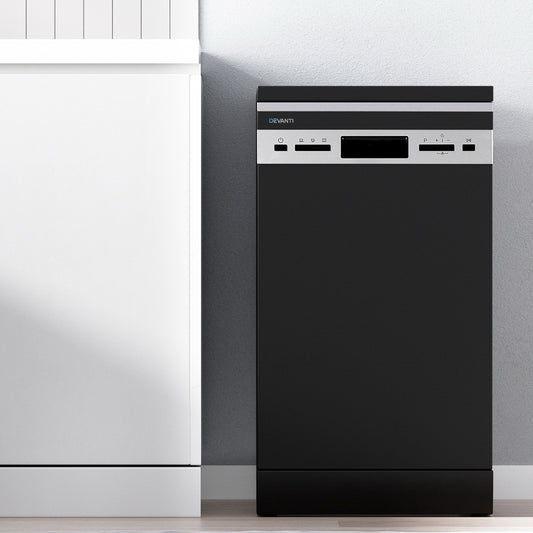 Black dishwasher against a white kitchen wall