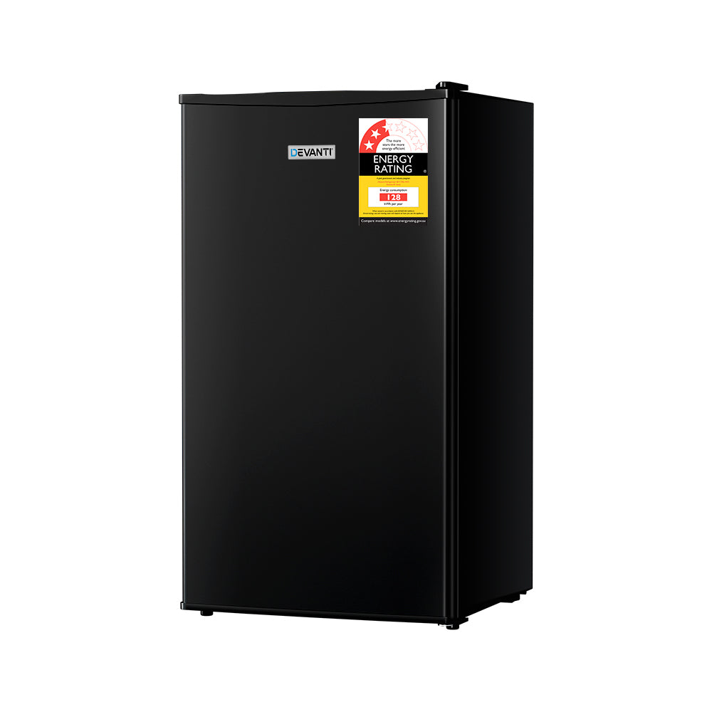 Black refrigerator with energy rating labels on a white background