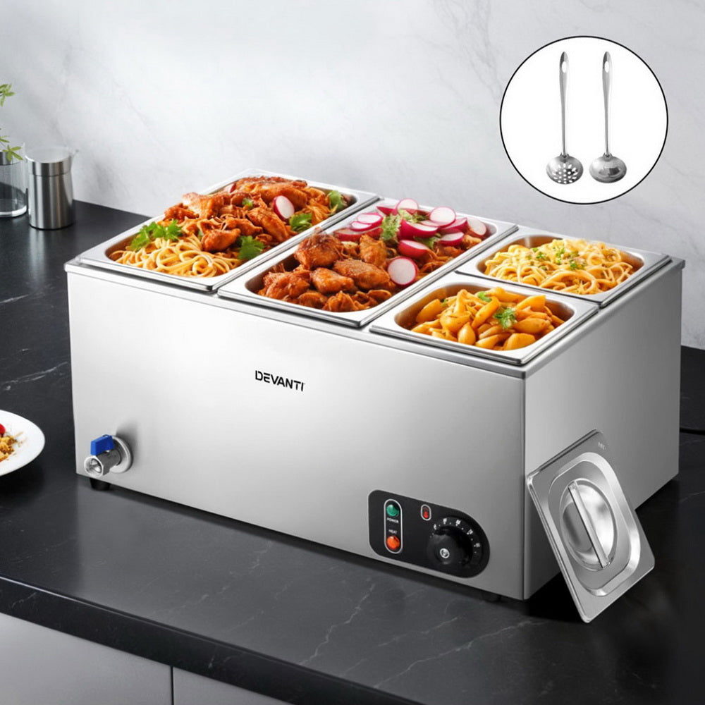 Devanti buffet warmer with three compartments filled with different dishes on a kitchen counter.