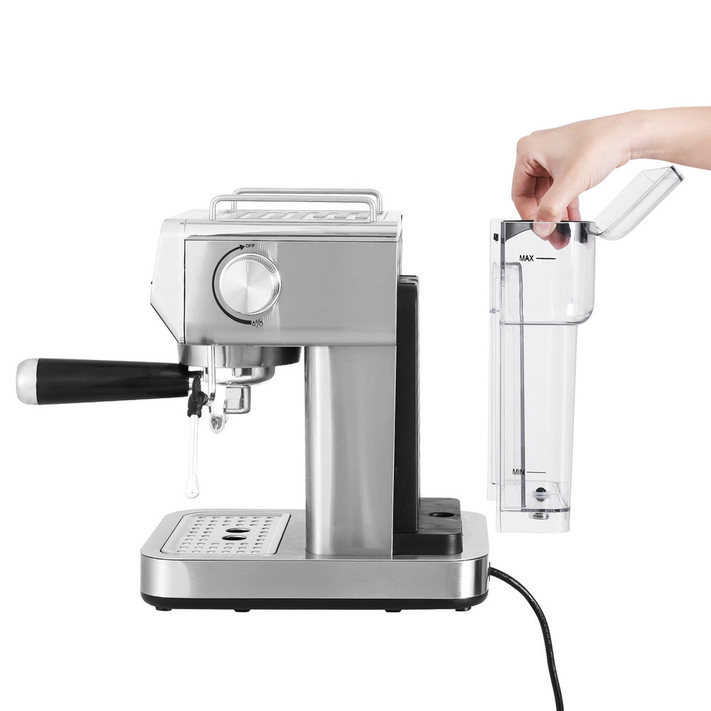 Espresso machine with clear container attached on a white background