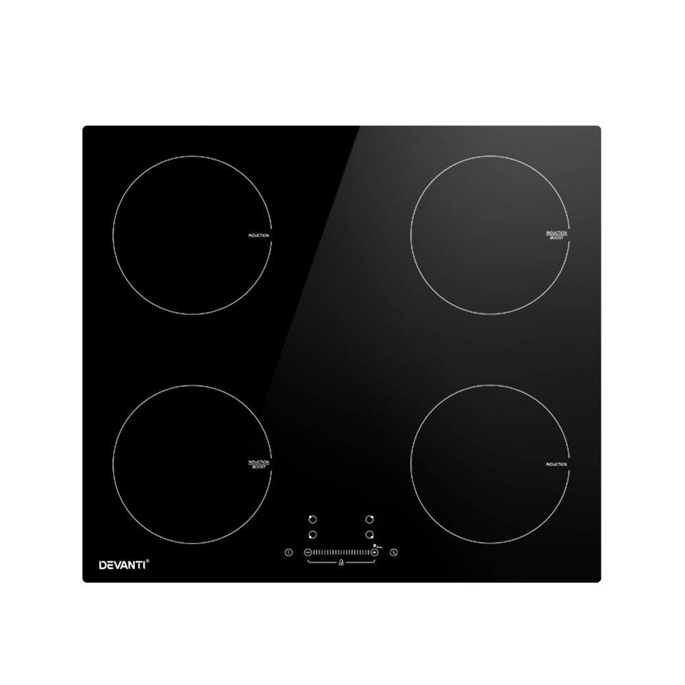 Black glass cooktop with four heating zones on a white background