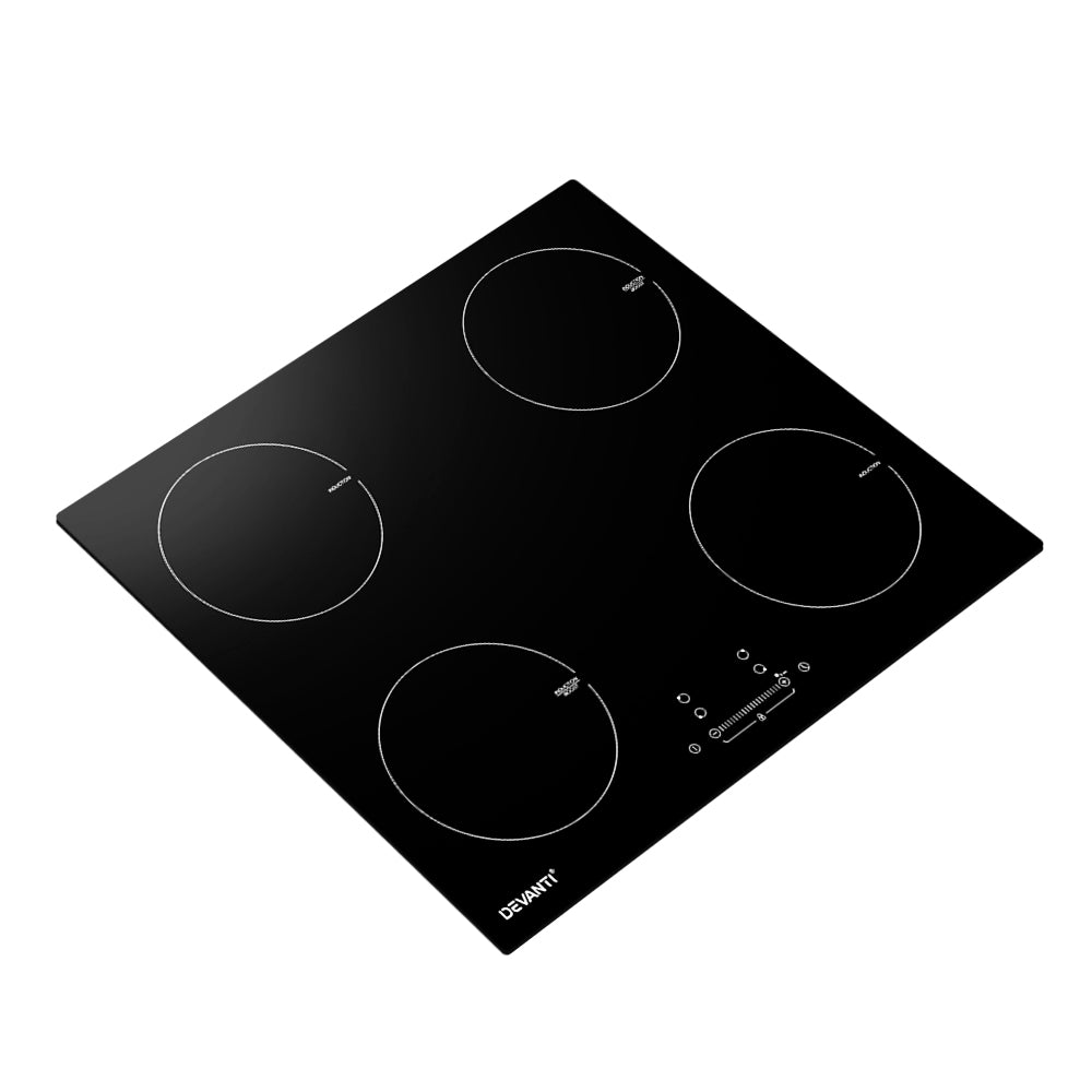 Black ceramic cooktop with four heating elements on a white background