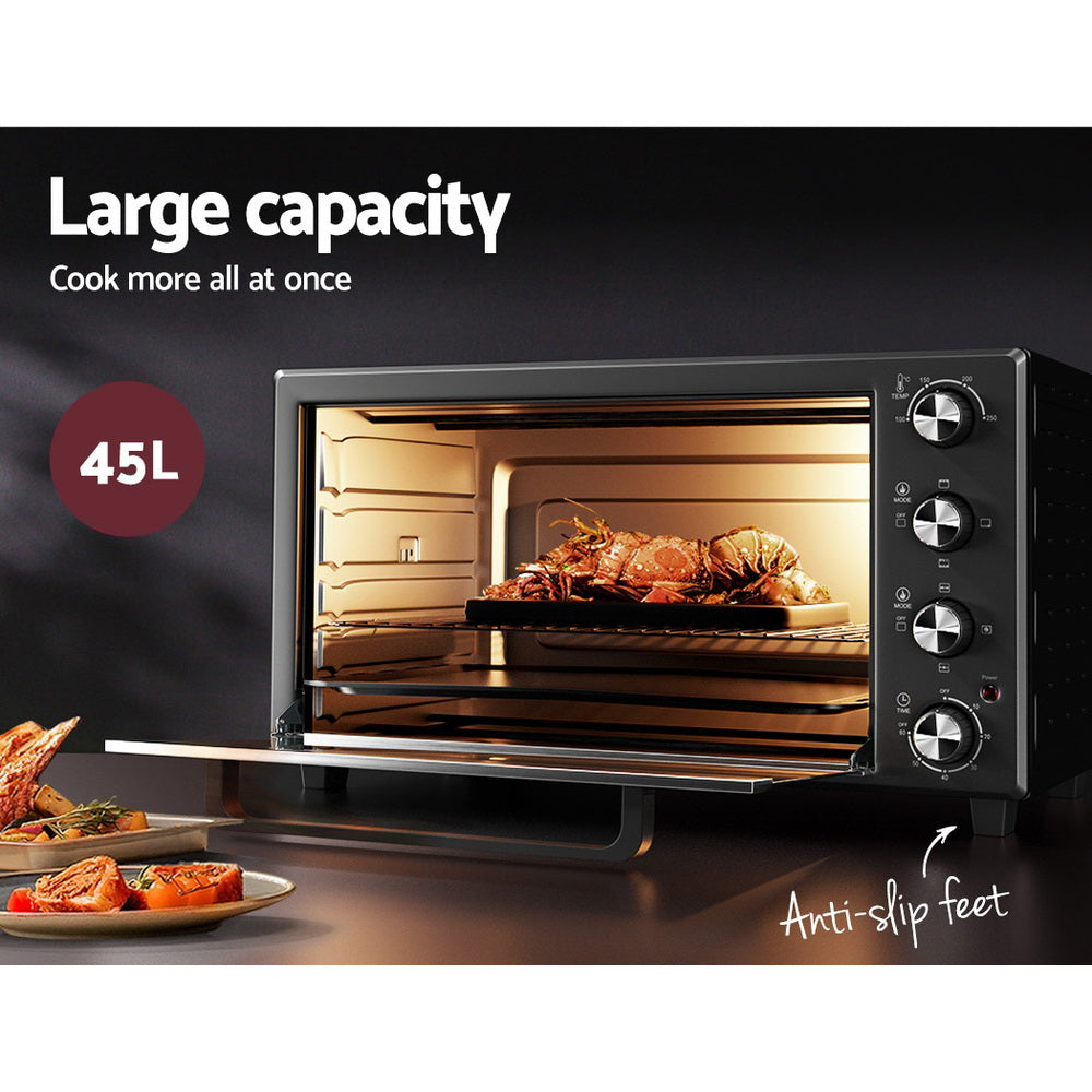 Portable Devanti convection oven placed on a kitchen countertop, ready for use.