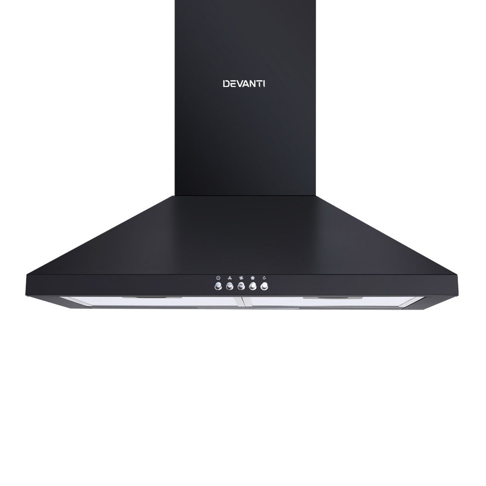 Range hood in use above cooktop