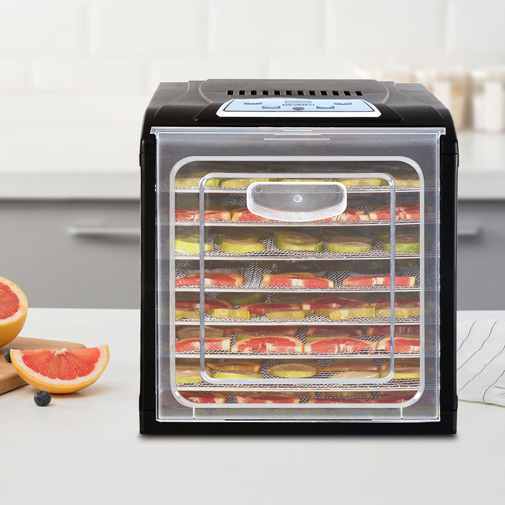 Complete product view with all trays, power cord, and instructional manual included.