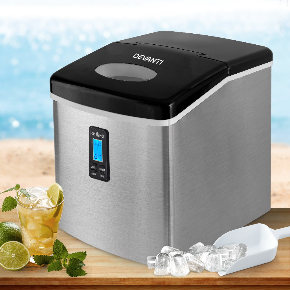 Devanti ice maker with a glass of lemonade and ice cubes on a wooden surface.