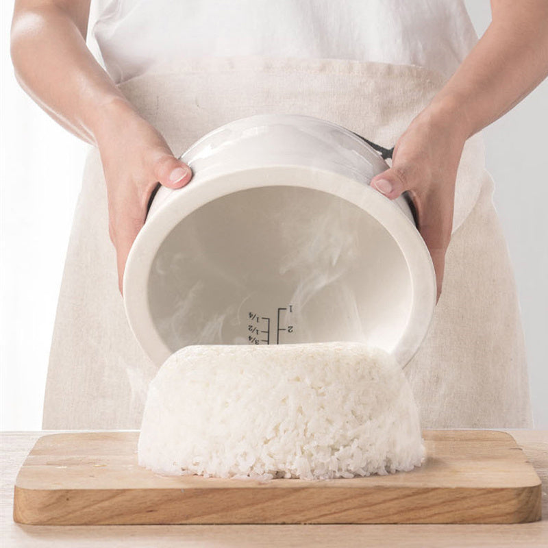 Close-up of the non-stick ceramic pot, highlighting its smooth, chemical-free surface.