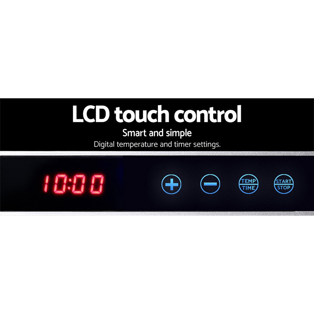Close-up of digital LCD touch control panel showing temperature and timer settings.