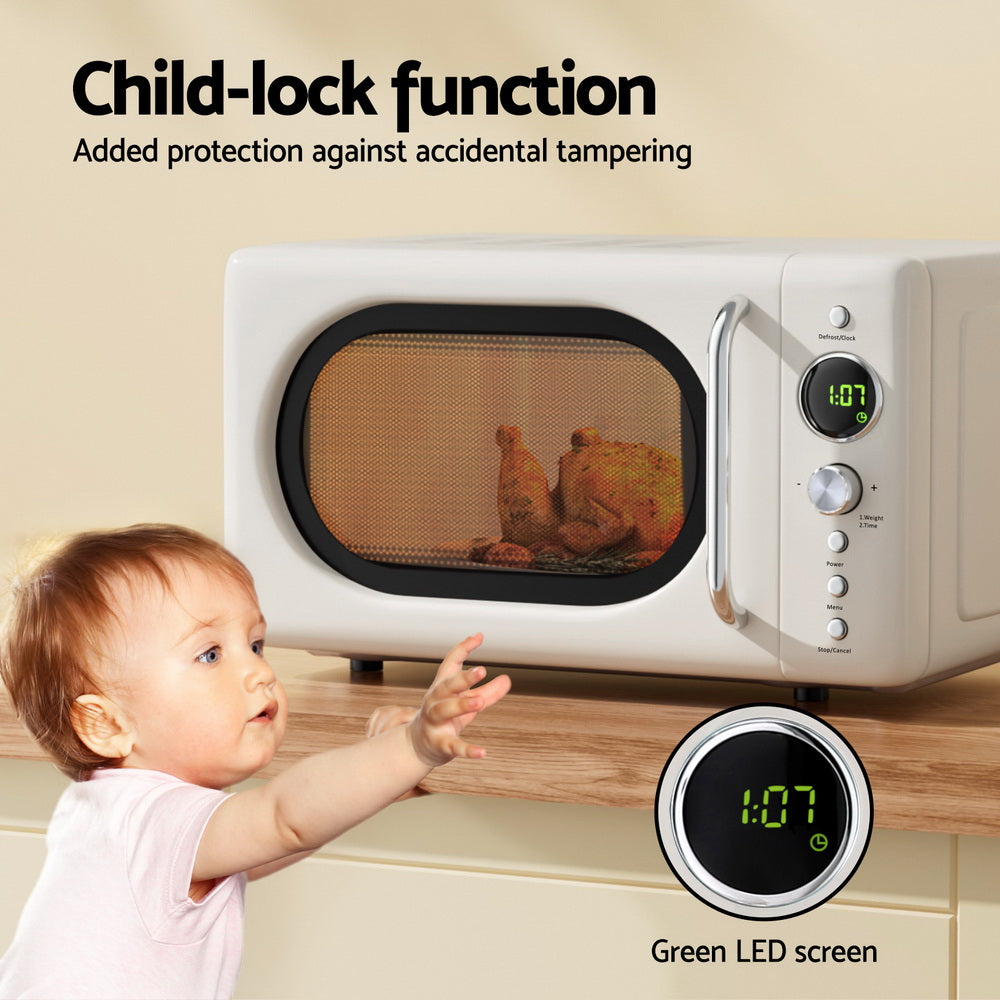 LED screen close-up of Devanti 20L Microwave Oven 700W with digital timer and cooking menu