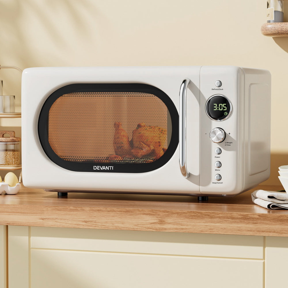 Devanti 20L Cream Microwave Oven displayed in a modern kitchen setting