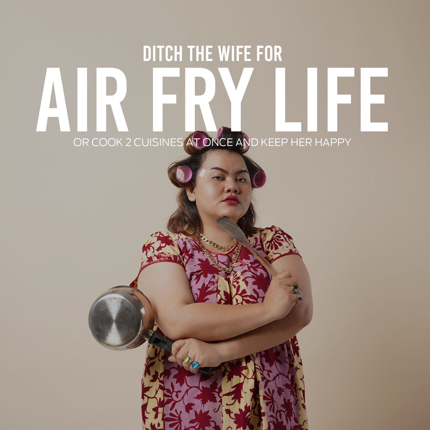Woman holding a large frying pan with text about air frying on a beige background
