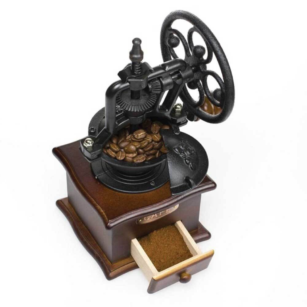 Vintage-style coffee grinder with wooden base and metal top on a white background