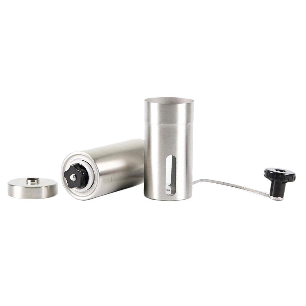 Metallic cylindrical device with components on a white background