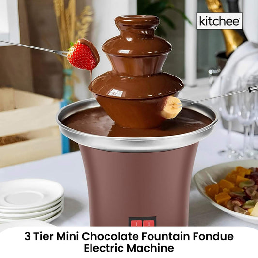 3 Tier Mini Chocolate Fountain Fondue Electric Machine with ingredients on a table
