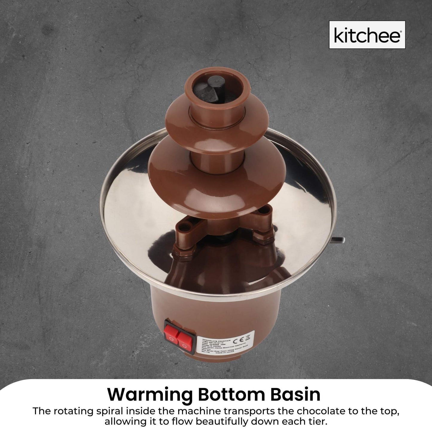 Chocolate fountain with warming bottom basin on a gray background, featuring the brand 'kitchee'.