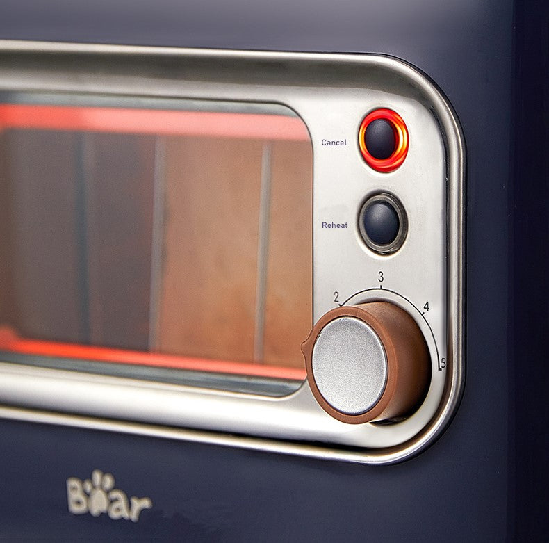 Close-up of a toaster oven with control panel and glass door