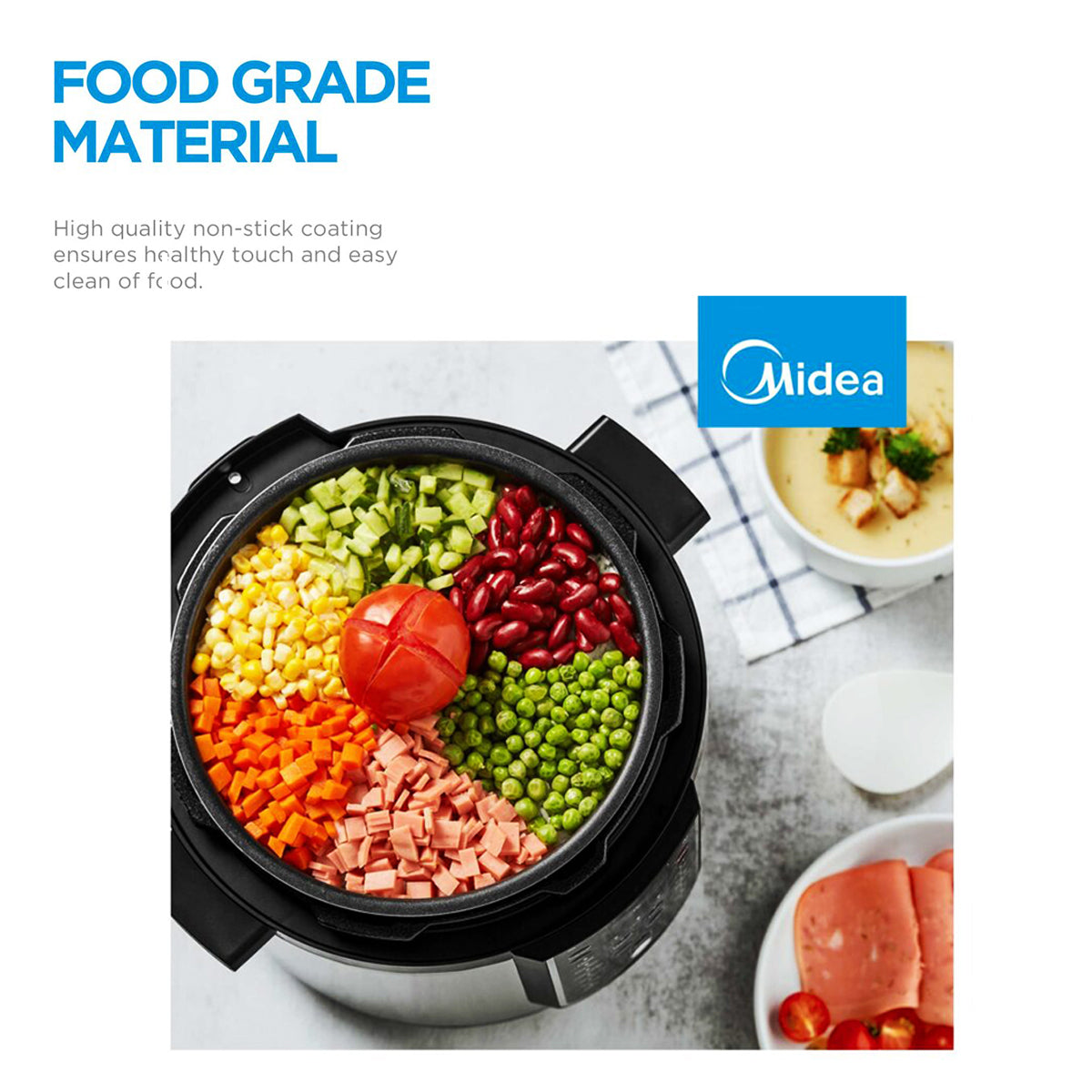 Midea food processor with ingredients inside on a light background