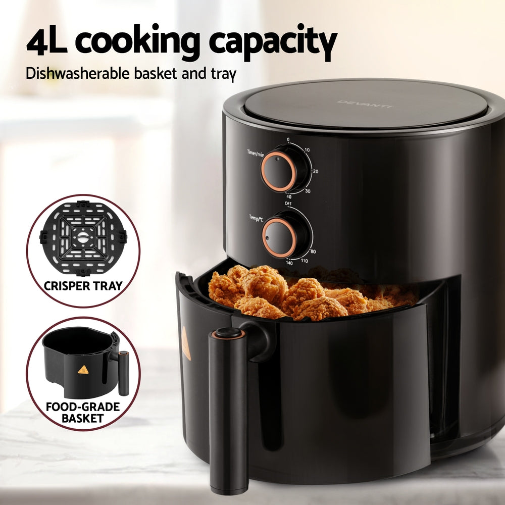 Black air fryer with food inside, featuring a crisper tray and food-grade basket on a light background.