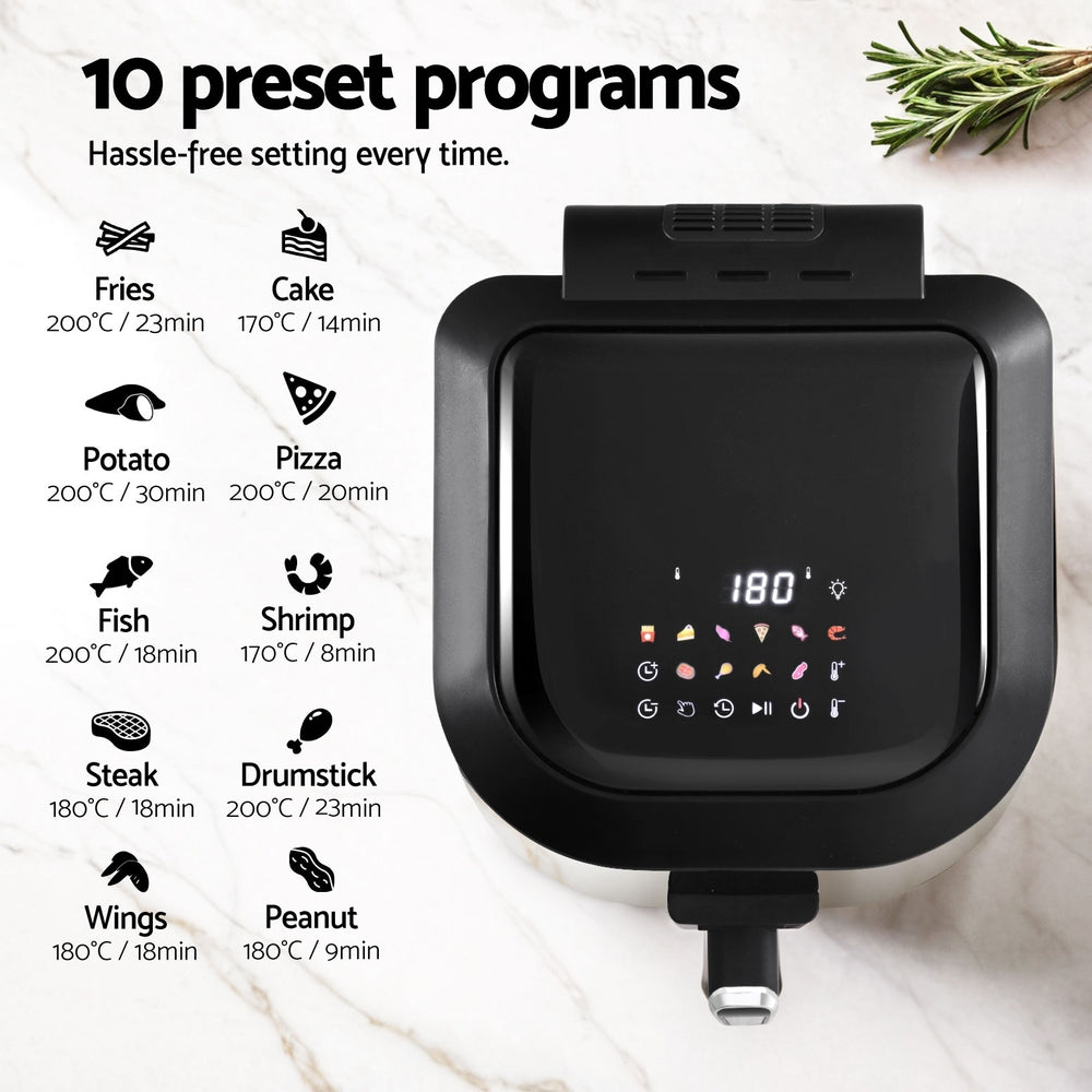 Black air fryer with digital display and preset cooking programs on a white background.