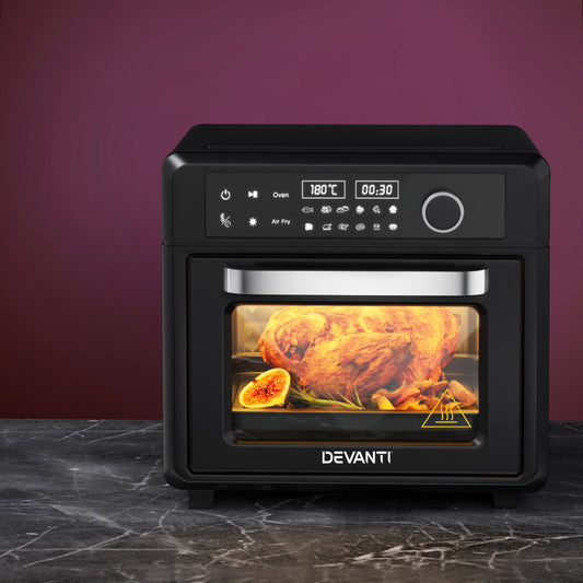 Devanti oven with a digital display showing a cooking time and temperature, with a roasted chicken inside on a dark surface.