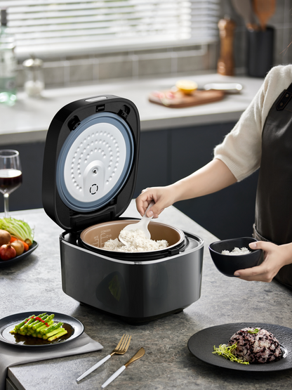 Side profile of BEAR 4L smart rice cooker showing ergonomic design.