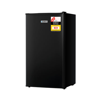Black refrigerator with energy rating labels on a white background