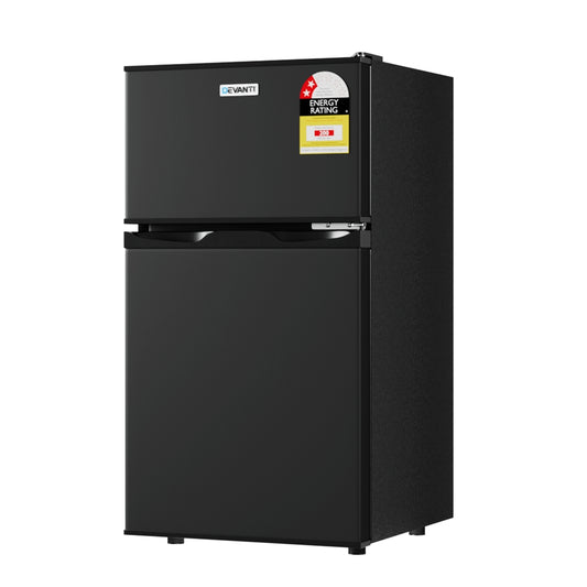 Black refrigerator with energy rating label on a white background