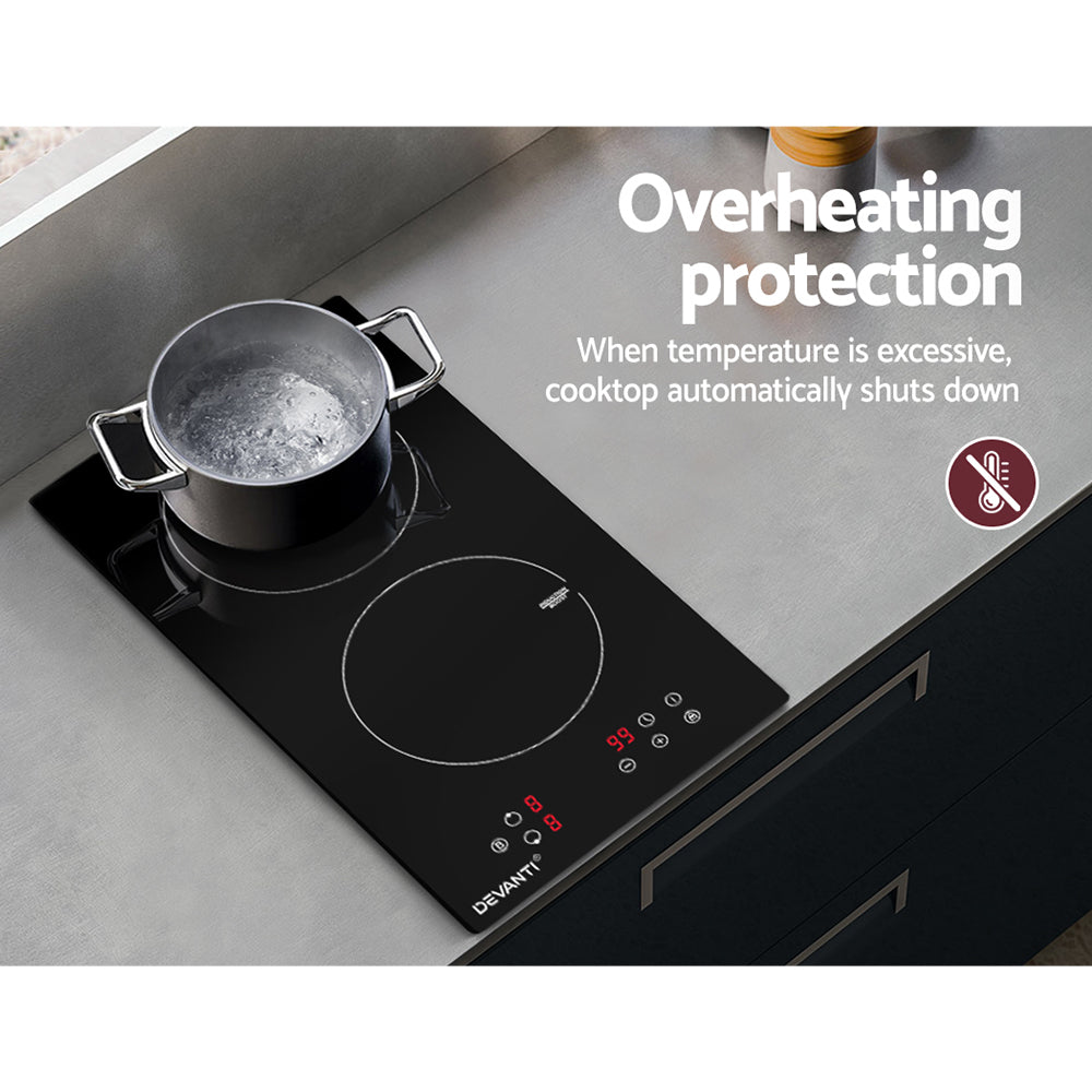 Induction cooktop with pot on a gray countertop, featuring overheating protection text.