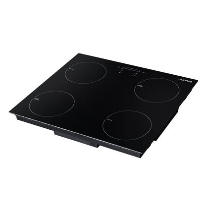 Black electric cooktop with four heating zones on a white background