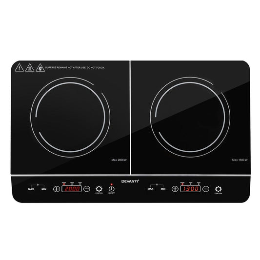 Black double induction cooktop with digital controls on a white background