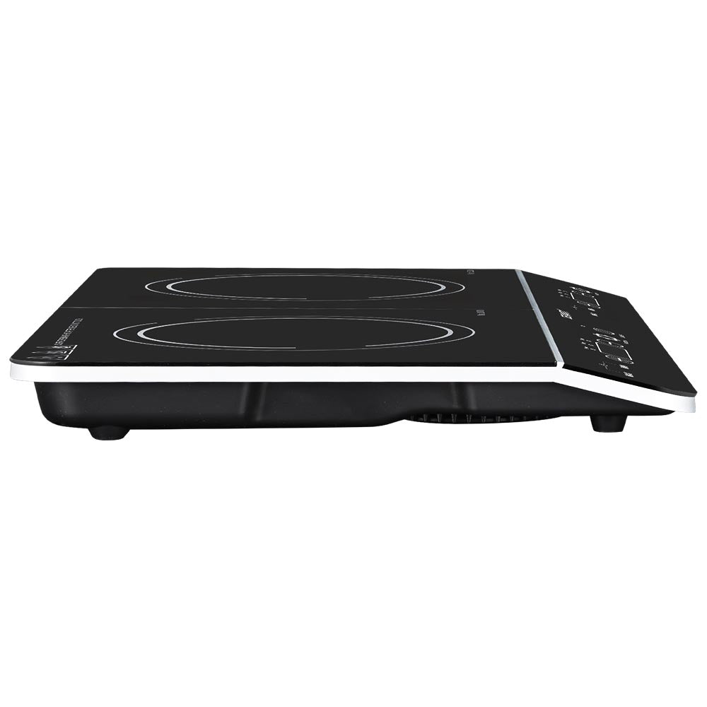 Black induction cooktop on a white background