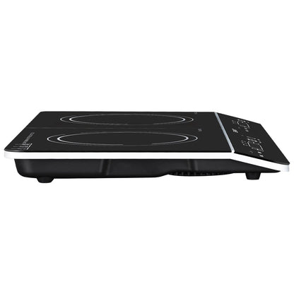 Black induction cooktop on a white background