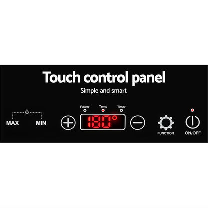 Touch control panel with digital display on a black background
