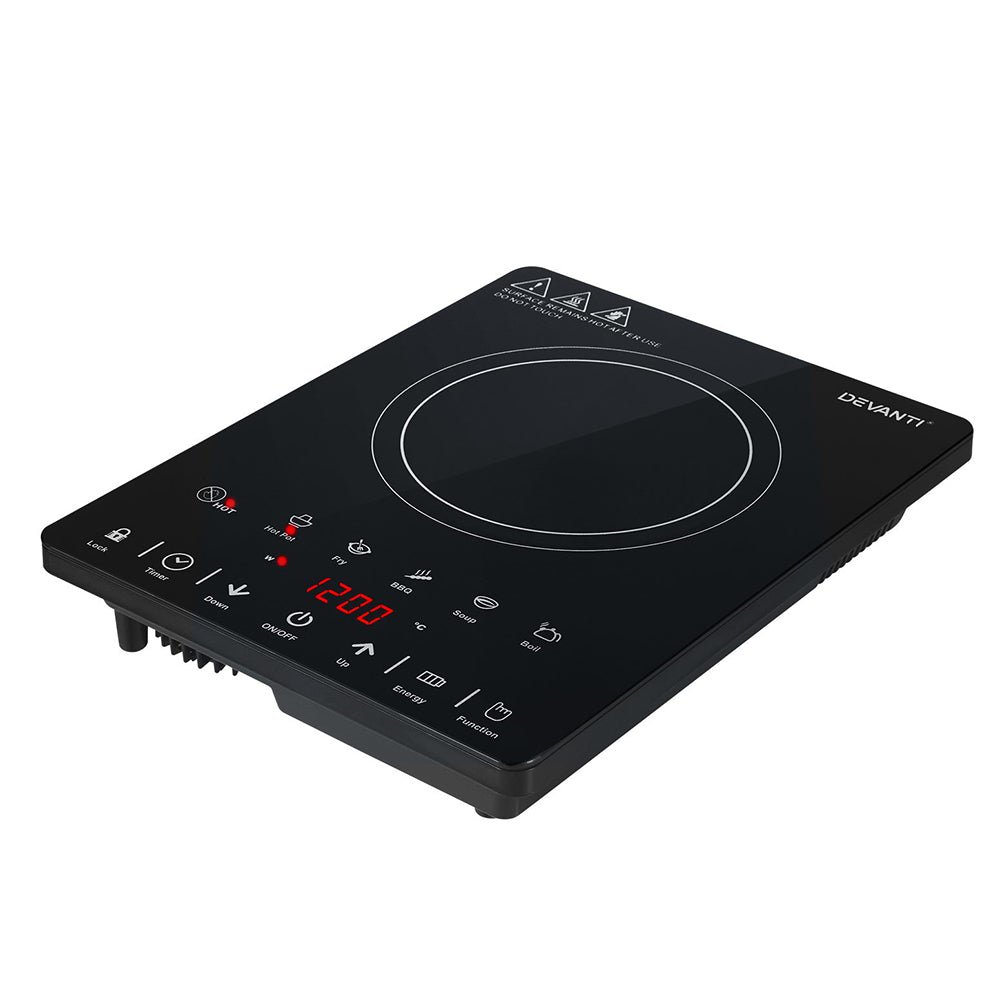 Black induction cooktop with digital display on a white background