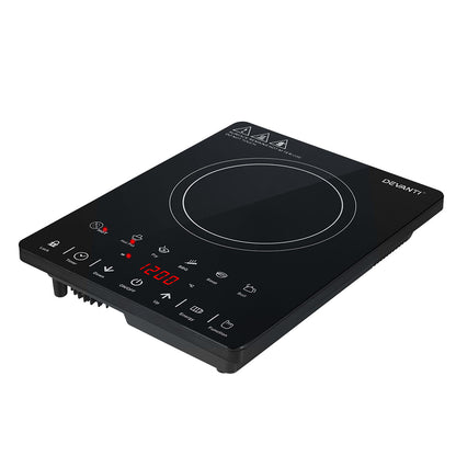 Black induction cooktop with digital display on a white background