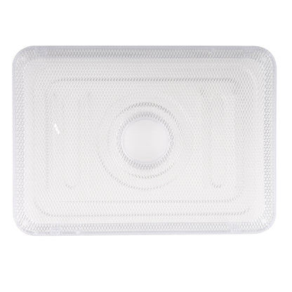 White bath mat with a circular design on a white background