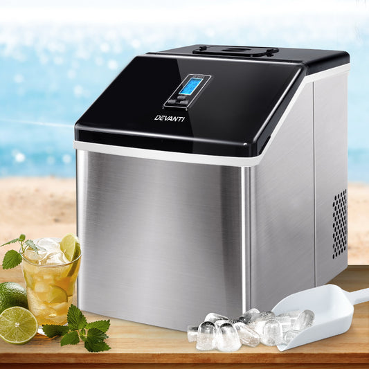 Devanti ice maker with a glass of lemonade and ice cubes on a wooden surface.