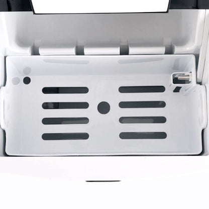 Close-up of a white electronic device with a metallic finish on a white background