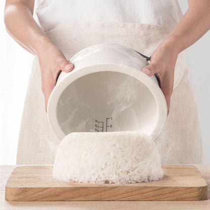 Close-up of the non-stick ceramic pot, highlighting its smooth, chemical-free surface.