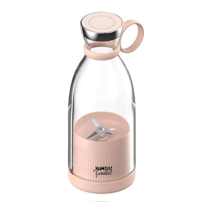 Front view of the pink Kitchen Couture portable blender with lid on
