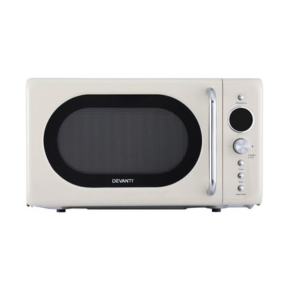 Front view of Devanti 20L Microwave Oven 700W in cream, featuring digital LED screen and pull door design