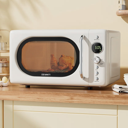 Devanti 20L Cream Microwave Oven displayed in a modern kitchen setting