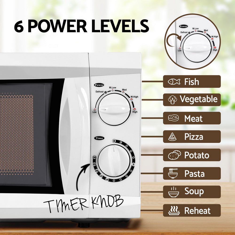 Close-up of mechanical control knobs on the Devanti 20L Microwave Oven

