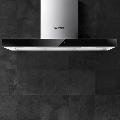Devanti range hood in use with LED lights illuminating cooktop area.