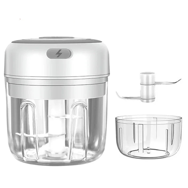 White hand blender with clear attachments on a white background