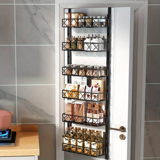 Vertical spice rack mounted on a kitchen door with various jars and containers.