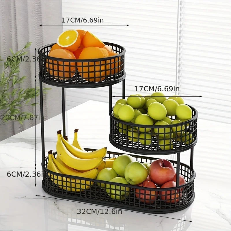 Three-tiered black fruit basket with fruits on a white surface, showing dimensions.
