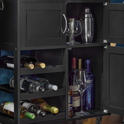 Black bar cart with bottles, glasses, and a cocktail shaker inside.