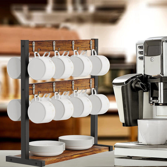 Wooden mug rack with white mugs and bowls next to a coffee machine in a kitchen setting
